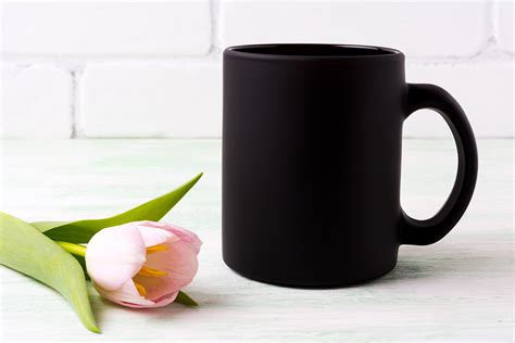 Download Black coffee mug mockup with  pink tulip.